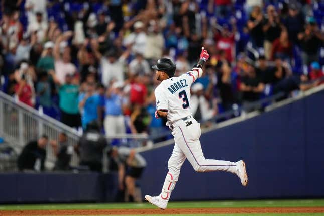 Aug 14, 2023; Miami, Florida, USA; Miami Marlins second baseman Luis Arraez (3) rounds the bases after hitting a home run against the Houston Astros during the eighth inning at loanDepot Park.