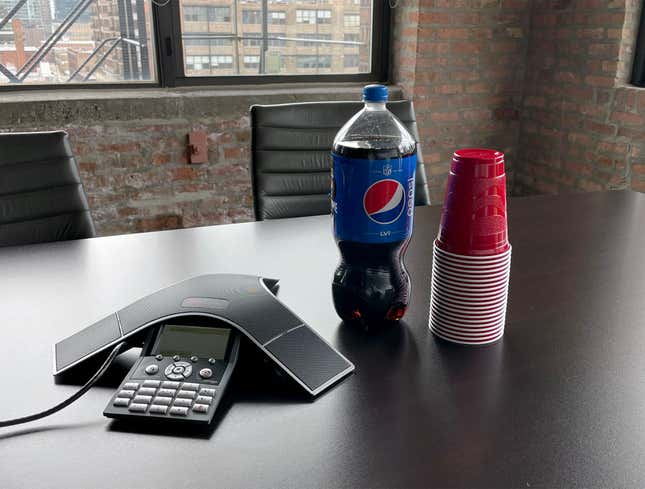 Image for article titled Bottle Of Pepsi Only Thing Distinguishing Office Party From Regular Staff Meeting