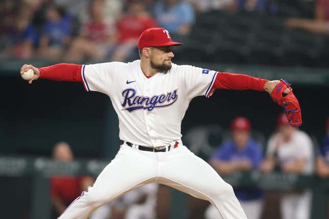 Jun 15, 2023; Arlington, Texas, USA; Texas Rangers starting pitcher Nathan Eovaldi (17) throws a pitch in the first inning against the Los Angeles Angels at Globe Life Field.