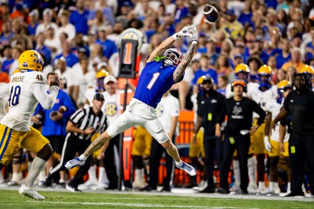 Sep 9, 2023; Gainesville, Florida, USA; Florida Gators wide receiver Ricky Pearsall (1) misses a catch as McNeese State Cowboys linebacker Micah Davey (48) runs to defend during the first half at Ben Hill Griffin Stadium.