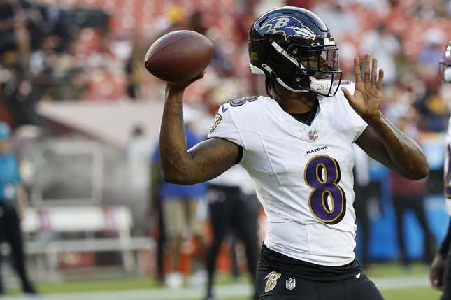 Aug 21, 2023; Landover, Maryland, USA; Baltimore Ravens quarterback Lamar Jackson (8) passes the ball during warmups prior to their game against the Washington Commanders at FedExField.