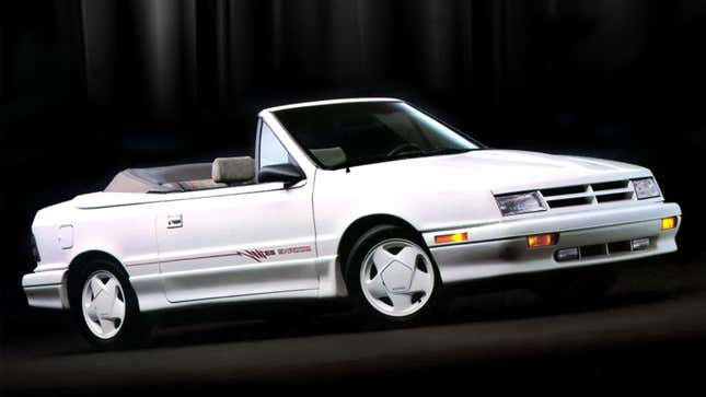 A photo of a white Dodge Shadow convertible. 