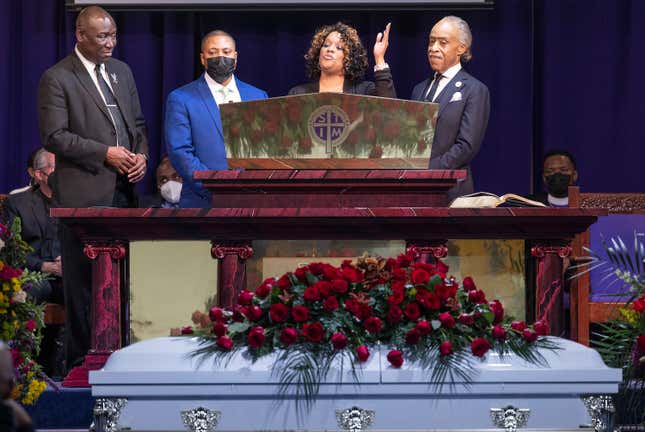Amir Locke’s mother Karen Well, speaks of her son alongside her husband Andre Locke, Sr., their attorney Ben Crump, left, and Rev. Al Sharpton, right, during Amir’s funeral at Shiloh Temple International Ministries, Thursday, Feb. 17, 2022, in Minneapolis, Minn. Locke was killed Feb. 2 by Minneapolis police as they executed a no-knock search warrant.

