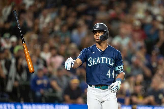 Aug 9, 2023; Seattle, Washington, USA; Seattle Mariners centerfielder Julio Rodriguez (44) tosses his bat after earning a walk against the San Diego Padres at T-Mobile Park.