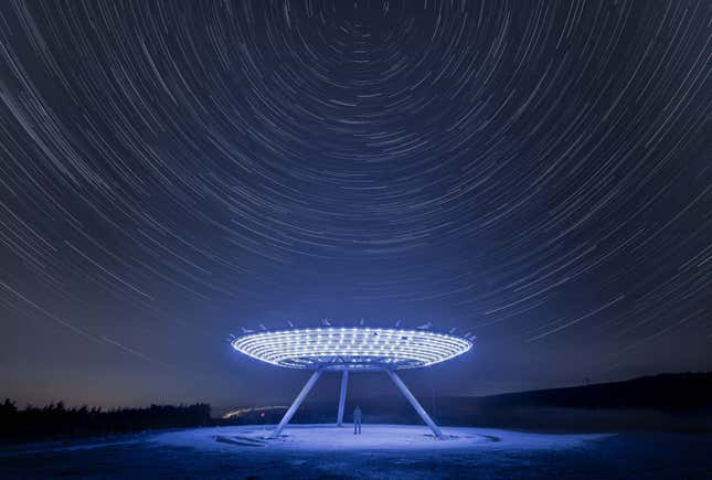 A highly commended image showing streaks of stars above a large sculpture in Lancashire.