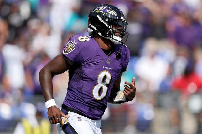 Lamar Jackson #8 of the Baltimore Ravens celebrates a touchdown pass in the second quarter against the Miami Dolphins at M&amp;T Bank Stadium on September 18, 2022, in Baltimore, Maryland.