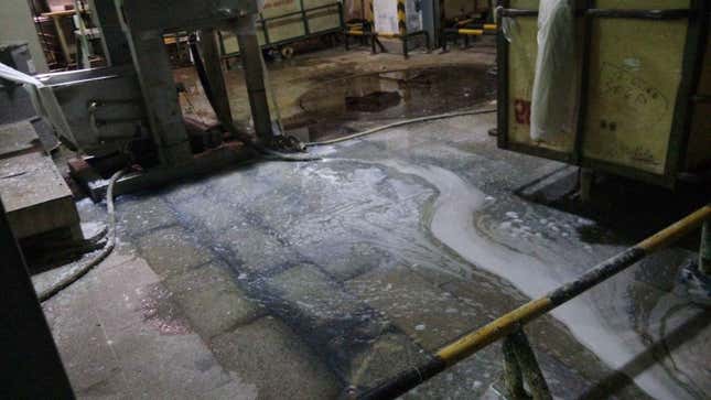 Sewage water covering the shop floor at a Uniqlo supplier in China.