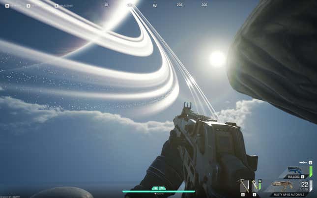 A player looks at a ringed planet while holding a gun.