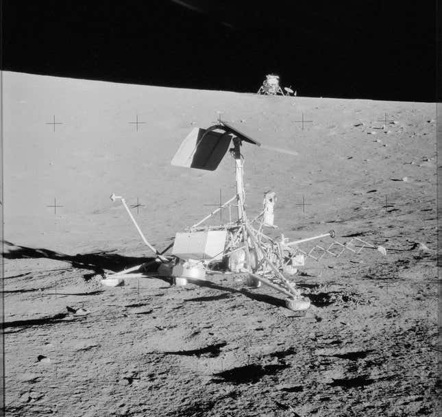 Surveyor 3 on the Moon, with the Apollo 12 Lunar Module in the background. 
