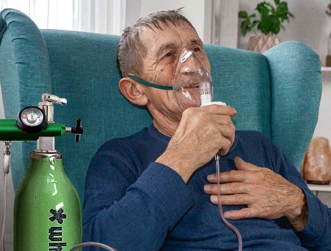 Image for article titled Elderly Party Guy Wheeling Around Portable Whippit Tank