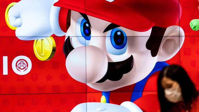 Pictured is Mario on a screen with gold coins at the Nintendo Store in Tokyo. 