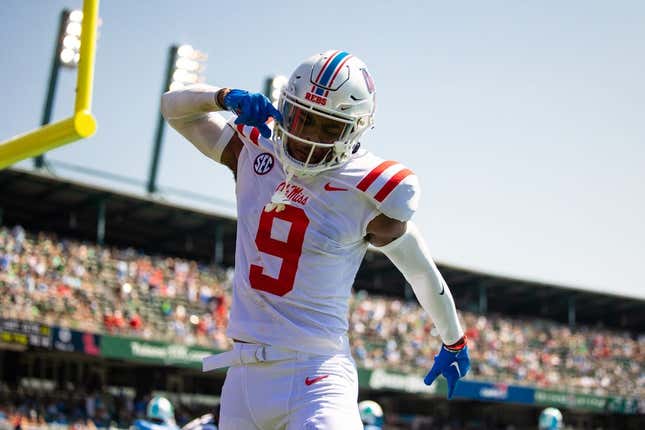 Sep 9, 2023; New Orleans, Louisiana, USA;   Mississippi Rebels wide receiver Tre Harris (9) catches a pass for a touchdown against the Tulane Green Wave during the first half at Yulman Stadium.