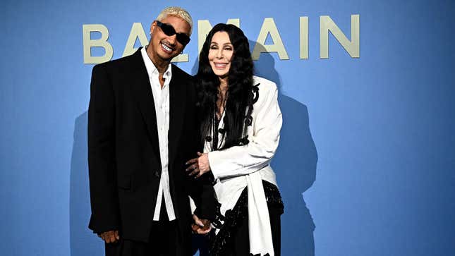 Alexander Edwards and Cher pose ahead of the Balmain show at Paris Fashion Week on Wednesday. 