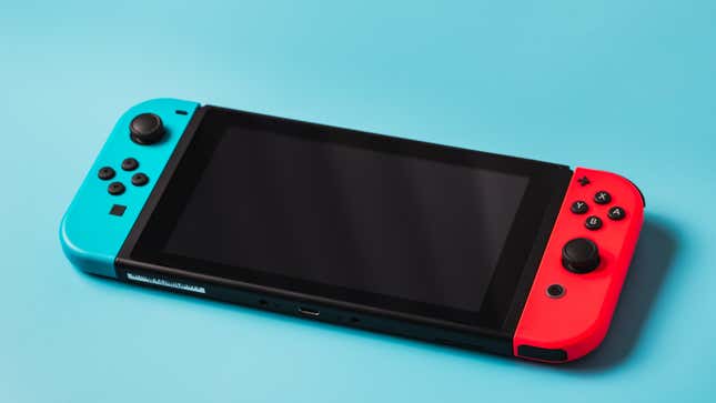 A Nintendo Switch sits against a blue background.