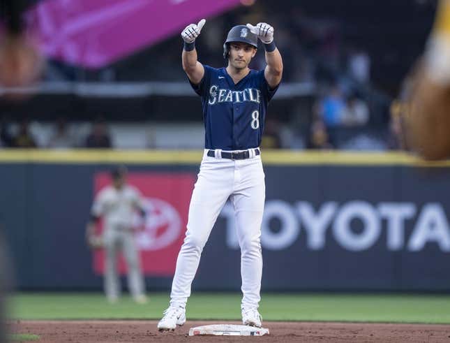 Aug 8, 2023; Seattle, Washington, USA; Seattle Mariners left fielder  Dominic Canzone (8) celebrates after hitting a single during the second inning against the San Diego Padres at T-Mobile Park.