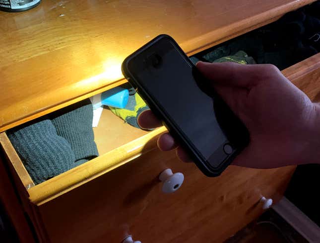 Image for article titled Man Shines Phone Light Over Empty Condom Drawer Like Wily Groundskeeper Hunting For Trespassers