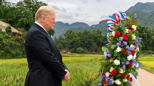 Image for article titled Trump Solemnly Lays Wreath At Site Where He Would Have Died During Vietnam War If He Weren’t Rich