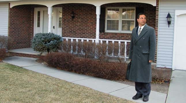 Feingold waits outside his house for a ride to work.
