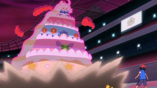 Gigantamax Alcremie is seen towering over Ash.