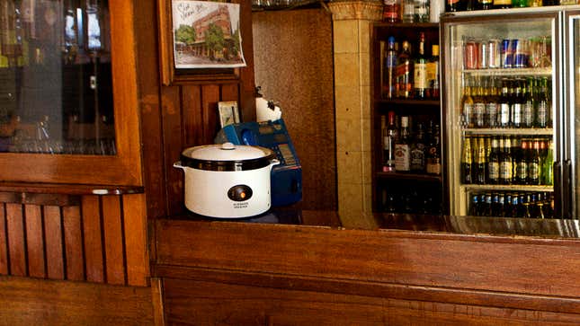 Image for article titled Report: Crock-Pot Of Chili Just Sitting There In Corner Of Dive Bar