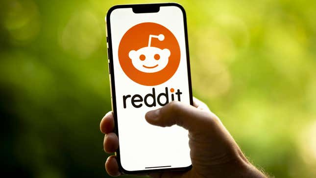 An image shows the Reddit logo open on a smartphone.