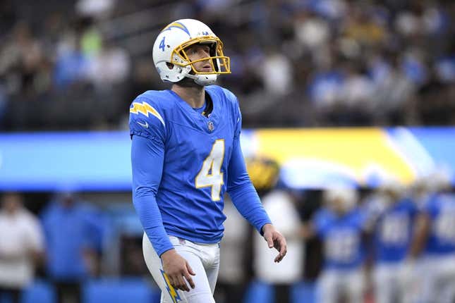 Aug 20, 2023; Inglewood, California, USA; Los Angeles Chargers place kicker Dustin Hopkins (4) prepares to kick a field goal against the New Orleans Saints during the first half at SoFi Stadium.
