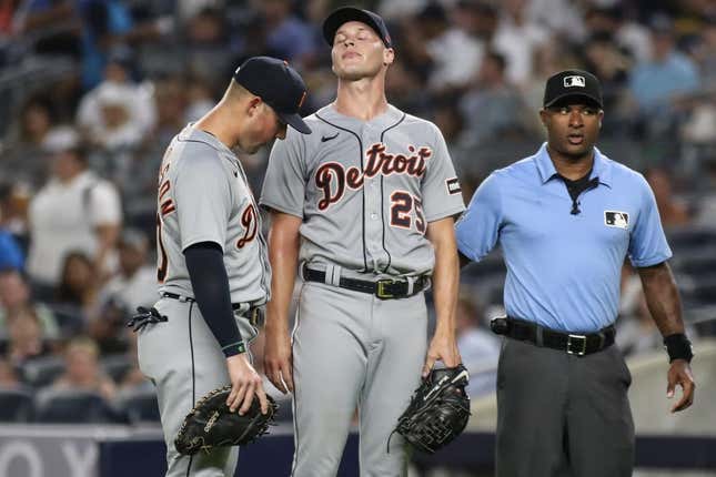 Sep 6, 2023; Bronx, New York, USA;  Detroit Tigers first baseman Spencer Torkelson (20) checks on starting pitcher Matt Manning (25) after he was hit by a line drive in the first inning against the New York Yankees at Yankee Stadium.