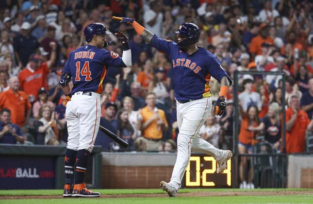 Houston Astros second baseman Mauricio Dubon bats during the sixth