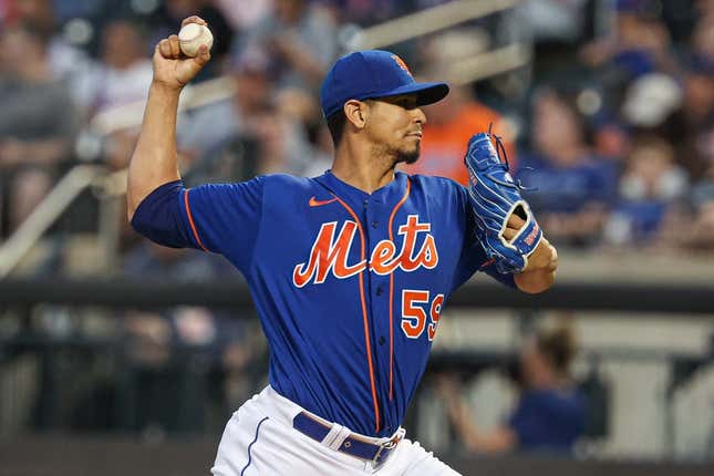 Aug 8, 2023; New York City, New York, USA; New York Mets starting pitcher Carlos Carrasco (59) delivers a pitch during the third inning against the Chicago Cubs at Citi Field.