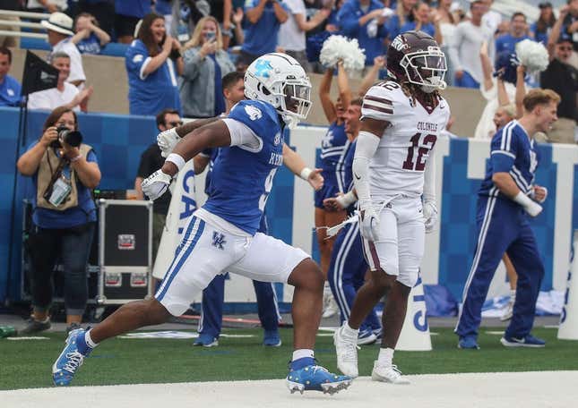 Kentucky Wildcats wide receiver Tayvion Robinson (9) celebrates his touchdown which helped pull the Wildcats even with Eastern Kentucky late in the second quarter Saturday. Sept. 9, 2023.