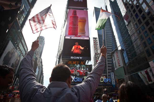Waving both flags (Reuters/Carlo Allegri)