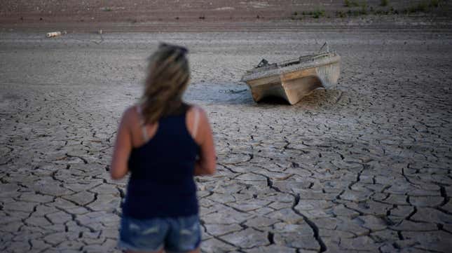 A formerly sunken boat sits on the cracked earth at Lake Mead National Recreation Area in Nevada. The reservoir is at record lows.