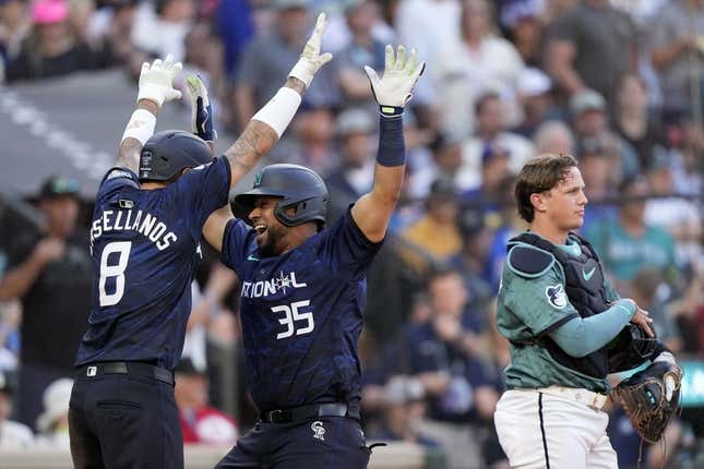 Jul 11, 2023; Seattle, Washington, USA; National League catcher Elias Diaz of the Colorado Rockies (35) reacts after hitting a two run home run against the American League during the eighth inning at T-Mobile Park.