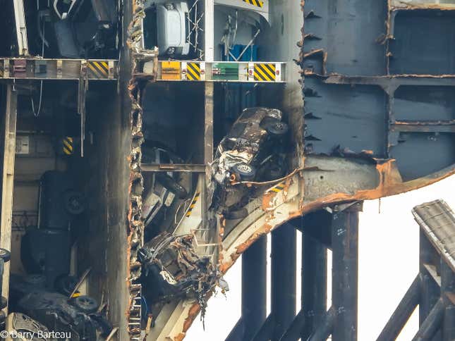 Image for article titled A Chain Just Cut Through A Capsized Cargo Ship Filled With Cars And The Process Is Fascinating (UPDATE W/VIDEO)