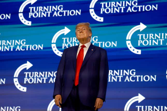 WEST PALM BEACH, FLORIDA - JULY 15: Former US President Donald Trump arrives on stage to speak at the Turning Point Action conference as he continues his 2024 presidential campaign on July 15, 2023 in West Palm Beach, Florida. Trump spoke at the event held in the Palm Beach County Convention Center. (