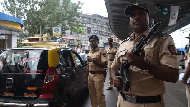 Armed police stand guard on the streets of Mumbai in November 2019 amid heightened tensions over a Supreme Court ruling on holy site contested by Hindus and Muslims.