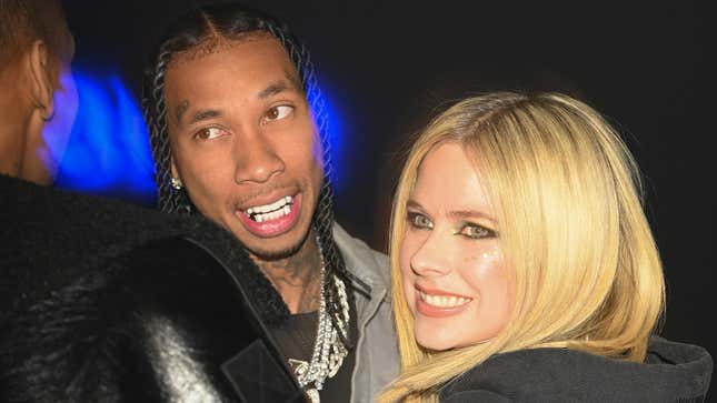 Tyga and Avril Lavigne attend the Mugler x Hunter Schafer party as part of Paris Fashion Week at Pavillon des Invalides on March 06, 2023 in Paris
