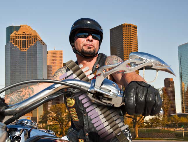 Image for article titled Bounty Hunter Tears Into Houston On Motorcycle Wearing Bandolier Of Pregnancy Tests