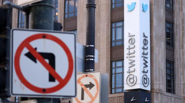 Twitter's main headquarters sign in front of several street signs with arrows pointing both left and right.