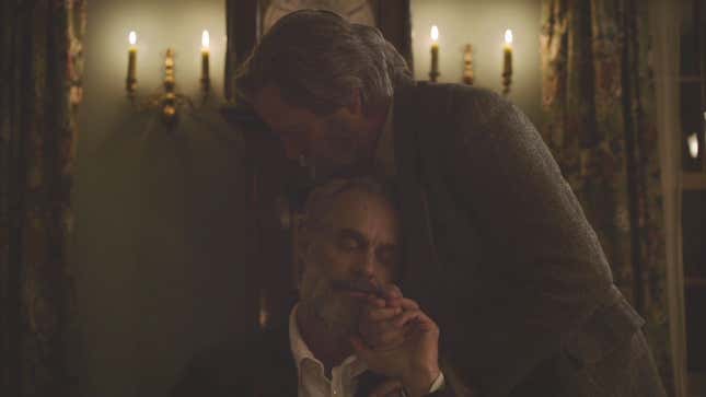 Bill and Frank are seen in their dining room, with Bill embracing Frank in his wheelchair.