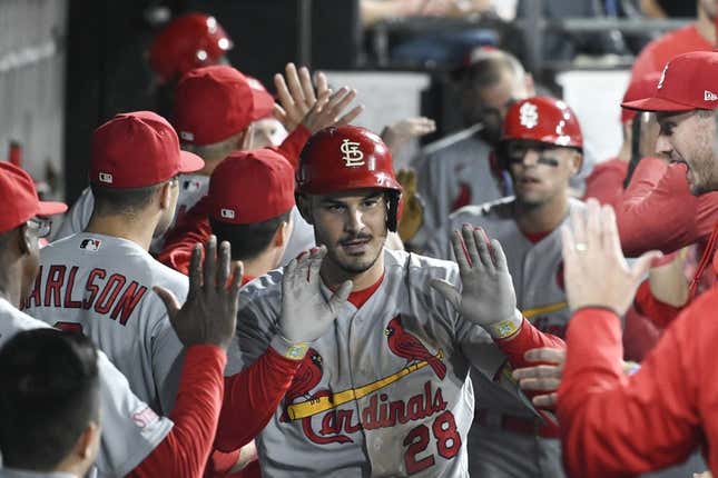 Jul 7, 2023; Chicago, Illinois, USA; St. Louis Cardinals third baseman Nolan Arenado (28) celebrates in the dugout after he hits a two run home run against the Chicago White Sox during the seventh inning at Guaranteed Rate Field.