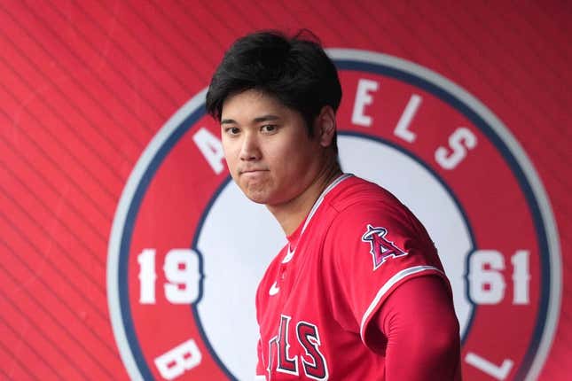 Aug 8, 2023; Anaheim, California, USA; Los Angeles Angels designated hitter Shohei Ohtani (17) watches from the dugout in the first inning against the San Francisco Giants at Angel Stadium.