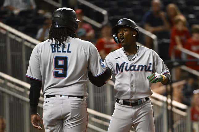 Aug 31, 2023; Washington, District of Columbia, USA; Miami Marlins center fielder Jazz Chisholm Jr. (2) celebrates with first baseman Josh Bell (9) after hitting a three run home run against the Washington Nationals during the fifth inning  at Nationals Park.