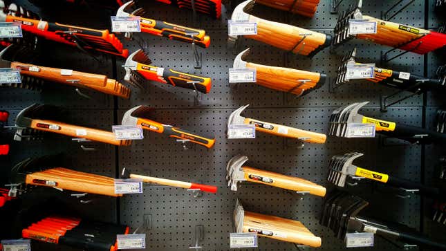 variety of different hammers for sale in hardware store