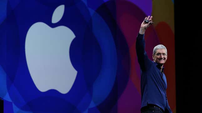 Apple CEO Tim Cook waves goodbye at an Apple keynote event