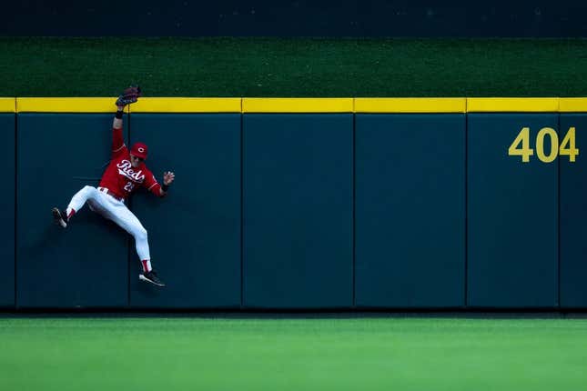 Cincinnati Reds left fielder TJ Friedl (29) catches a fly ball hit by Cleveland Guardians right fielder Ramon Laureano (10) in the third inning of the MLB baseball game between the Cincinnati Reds and the Cleveland Guardians at Great American Ball Park in Cincinnati on Wednesday, Aug. 16, 2023.