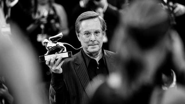 Director William Friedkin poses a Lifetime Achievement Award given to him at the 70th Venice International Film Festival on in 2012. 