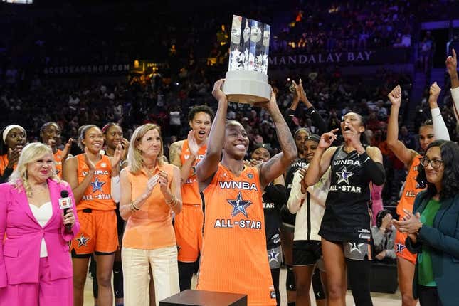 Jul 15, 2023; Las Vegas, NV, USA; Team Wilson guard Jewell Loyd (24) holds the MVP award during the 2023 WNBA All-Star Game at Michelob Ultra Arena.