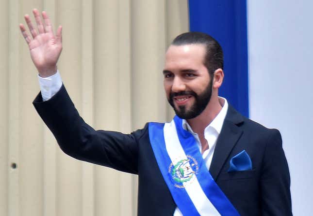 Salvador’s president, Nayib Bukele, waves during his inauguration ceremony at Gerardo Barrios Square outside the National Palace in downtown San Salvador, on June 1, 2019.