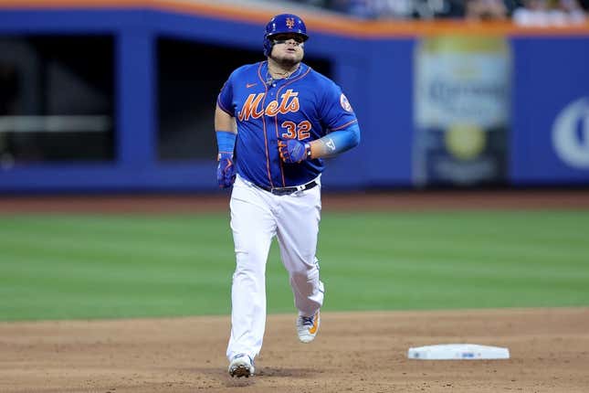 Aug 14, 2023; New York City, New York, USA; New York Mets designated hitter Daniel Vogelbach (32) rounds the bases after hitting a solo home run against the Pittsburgh Pirates during the second inning at Citi Field.
